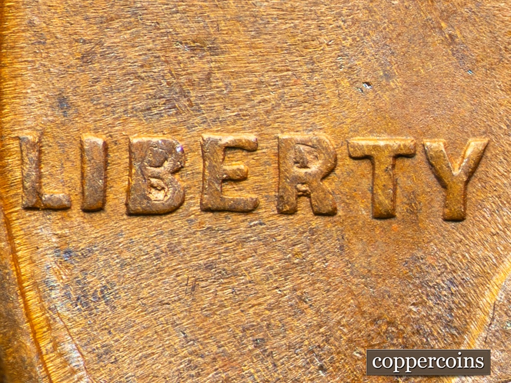 Die-stage F marker on 1909P•1DO•002 showing LIBERTY displays Die Chips in B and R.