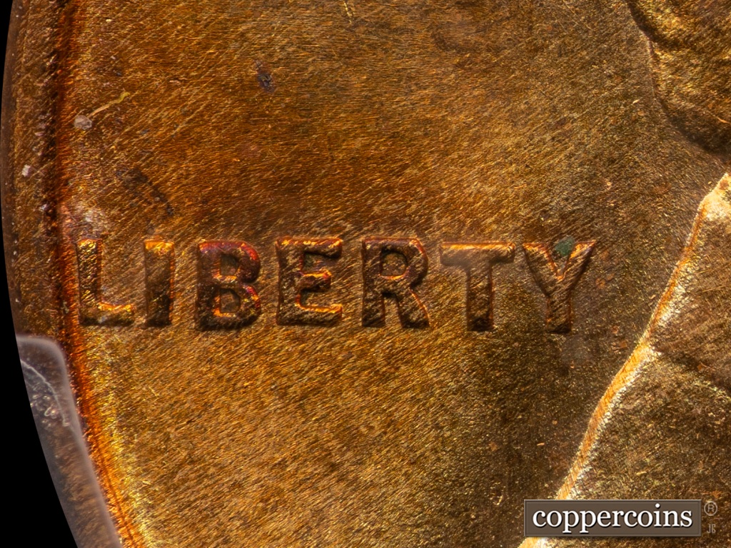 Die-stage A marker on 1909P•1DO•002 showing Extra thickness on LIBERTY.