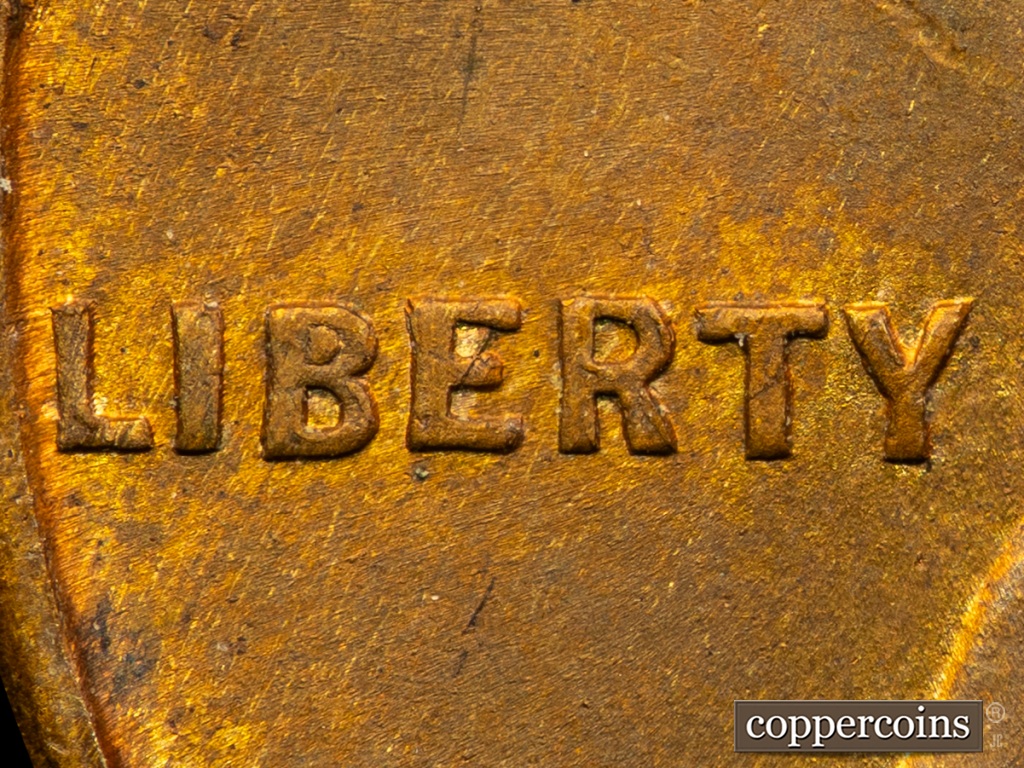 Die-stage B marker on 1909P•1DO•002 showing A Die Chip in the upper loop of the B in LIBERTY.