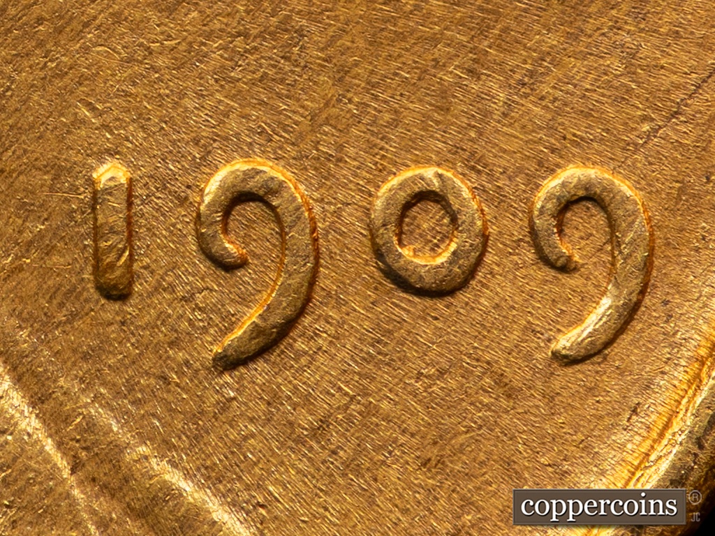 Die-stage C marker on 1909P•1DO•002 showing Extra Thickness on Date.