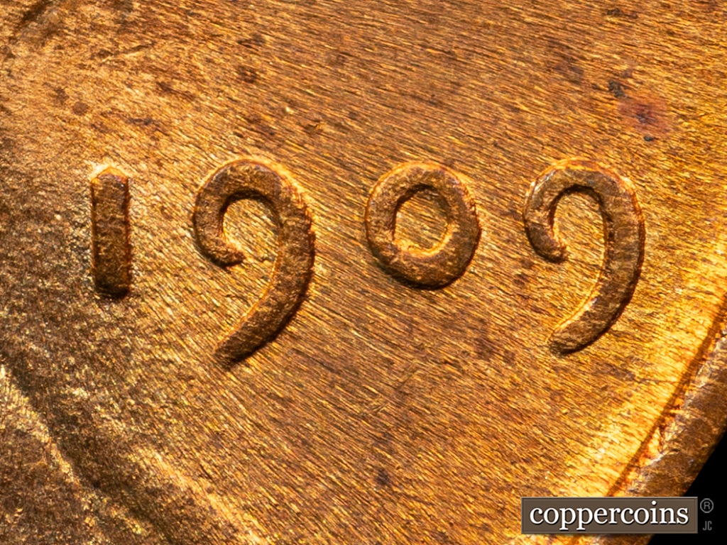 Die-stage E marker on 1909P•1DO•002 showing Extra Thickness on Date.