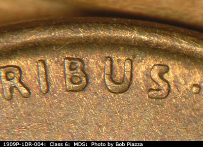 Die-stage B marker on 1909P•1DR•004 showing Extra thickness on EPU.