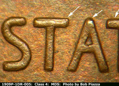 Die-stage B marker on 1909P•1DR•005 showing Doubling shows at the top of the letters in STATES.
