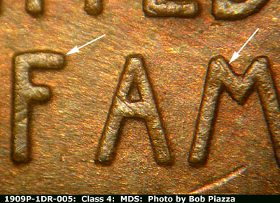 Die-stage B marker on 1909P•1DR•005 showing Doubling shows at the top of the letters in OF AMERICA.