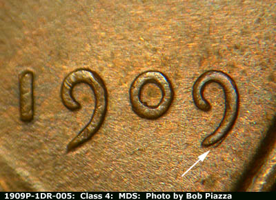 Die-stage B marker on 1909P•1DR•005 showing A small "tail" shows at the bottom of the second 9 of the date.