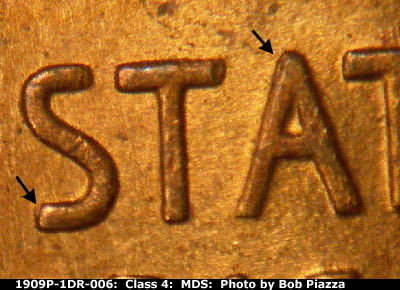 Die-stage B marker on 1909P•1DR•006 showing doubling shows to the north and west on the first S and the A of STATES.