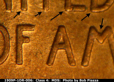 Die-stage B marker on 1909P•1DR•006 showing Showing doubling in various areas of the reverse.