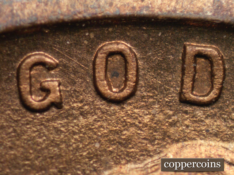 Die-stage A marker on 1909P•1DR•008P showing Diagonal oriented die scratches visible in GOD.