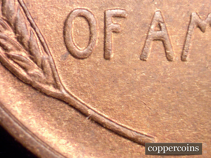 Die-stage B marker on 1909P•1DR•009 showing Extra thickness show on the lower left part of the O of OF and on the lower wheat.