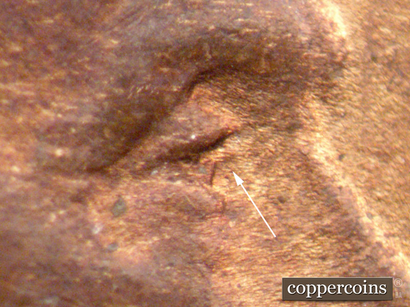Die-stage B marker on 1909P•1DR•009 showing Extra eyelid south of primary.