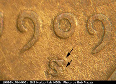 1909 Lincoln cent obverse, CopperCoins die 1909S•1MM•002 — Arrows point to the lower right curve of the bottom of a sideways turned S mint mark.
