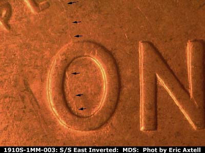 Die-stage B marker on 1910S•1MM•003 showing A die crack shows from the bottom of the O of one to the north toward the U of Pluribus.