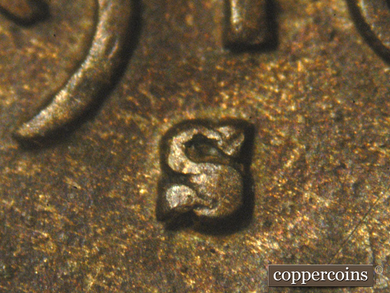Die-stage A marker on 1910S•1MM•004 showing This repunched mint mark shows a die chip inside the lower part of the S. In Later die stages this shows as a blob in….