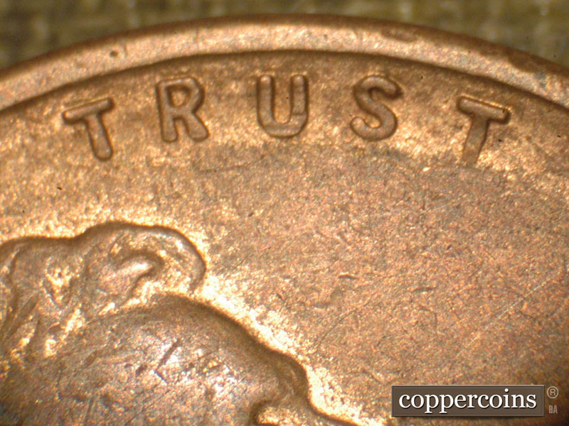 Die-stage B marker on 1910S•1MM•004 showing The area around trust and the die Ware shown in that area.