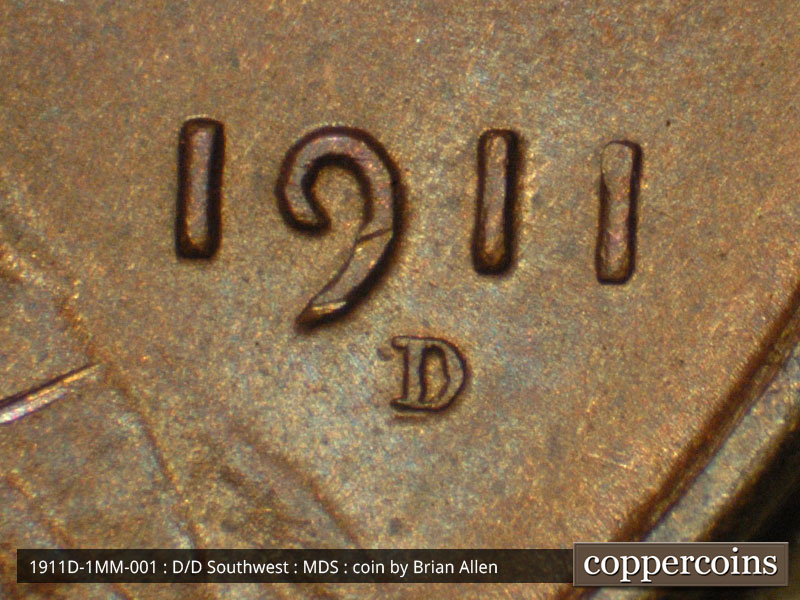 Die-stage B marker on 1911D•1MM•001 showing Date and mint mark for mint mark positioning.
