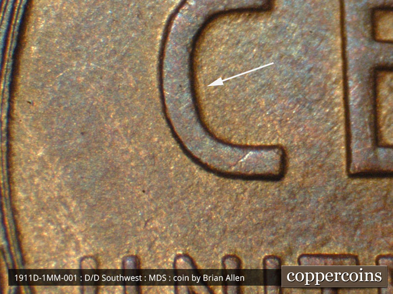 Die-stage B marker on 1911D•1MM•001 showing Die scratch on inside of C in CENT.