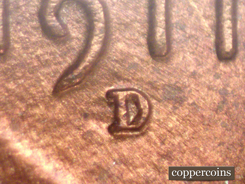 Die-stage A marker on 1911D•1MM•002 showing Secondary D punched south/southeast of primary D.