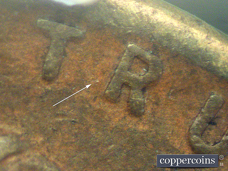 Die-stage A marker on 1911D•1MM•003 showing Die dot next to R of TRUST in motto.