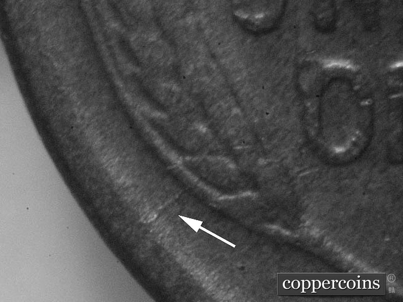 Die-stage B marker on 1911D•1MM•003 showing DIe crack from rim to lower left wheat stalk.