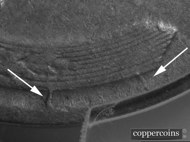 Die-stage B marker on 1911D•1MM•003 showing Die cracks from rim into right wheat stalk.