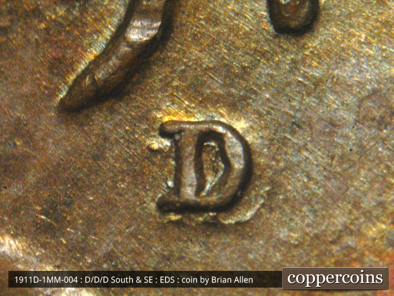 Die-stage A marker on 1911D•1MM•004 showing Very nice duplication of the mint mark shows clearly as raised ridges through the mintmark area.