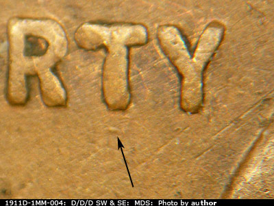 Die-stage B marker on 1911D•1MM•004 showing A die dot shows to the south of the T of LIBERTY.