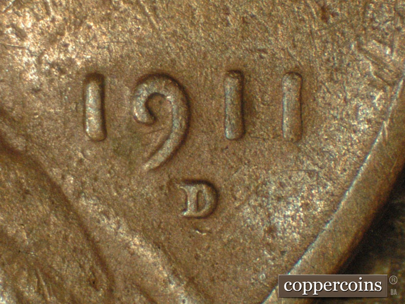 Die-stage C marker on 1911D•1MM•005 showing The position of the RPM shows best with the entire date visible.