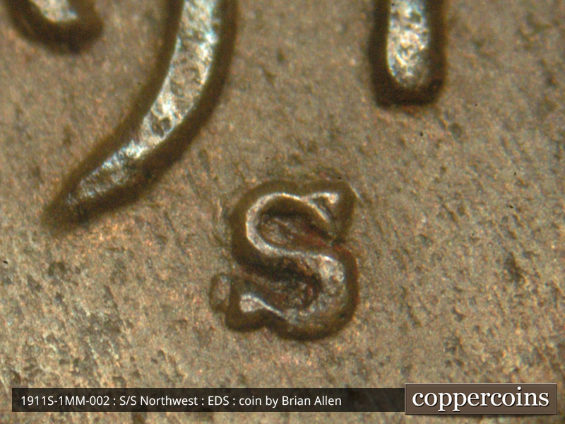 Die-stage A marker on 1911S•1MM•002 showing Date and mint mark area For visual comparison.