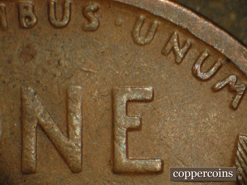 Die-stage B marker on 1912D•1MM•001 showing Die scratches, most old, show in UNUM.