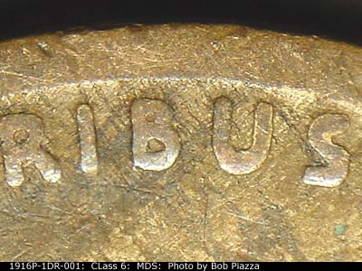 Die-stage B marker on 1916P•1DR•001 showing The center area of E pluribus Unum showing the doubling.