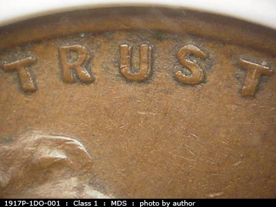 Die-stage B marker on 1917P•1DO•001 showing Image of the word trust to show strength in doubling.
