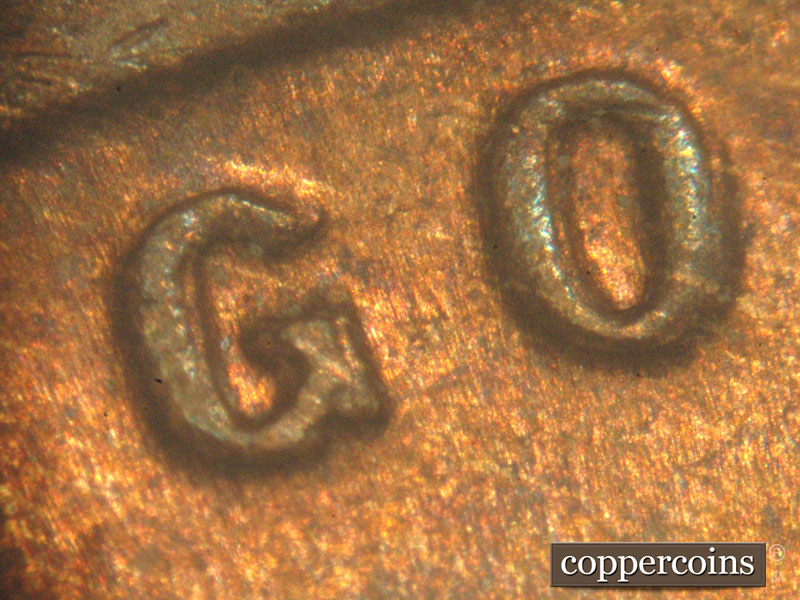 Die-stage C marker on 1917P•1DO•001 showing Doubling on GO in GOD.