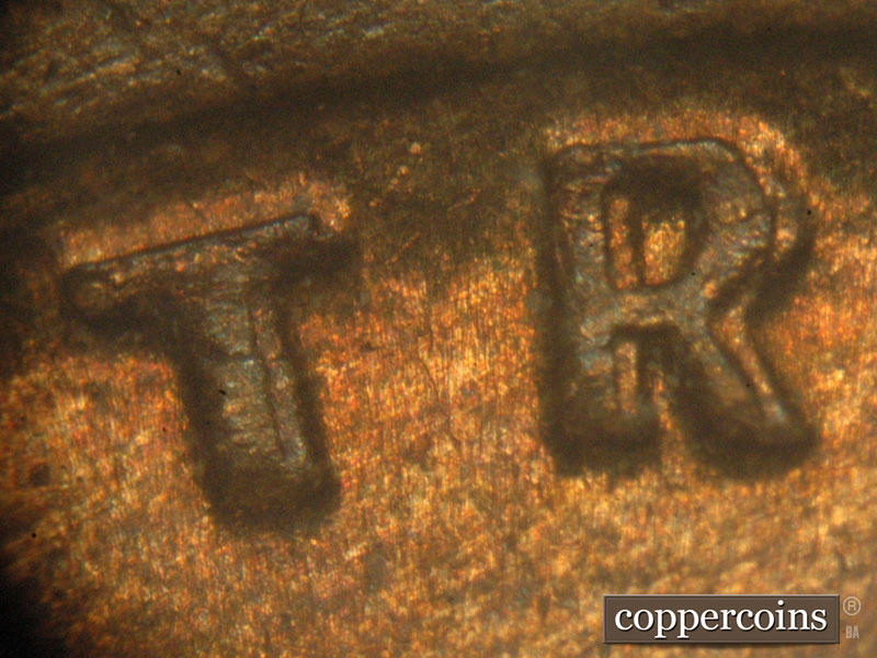 Die-stage C marker on 1917P•1DO•001 showing Doubling on TR in TRUST.