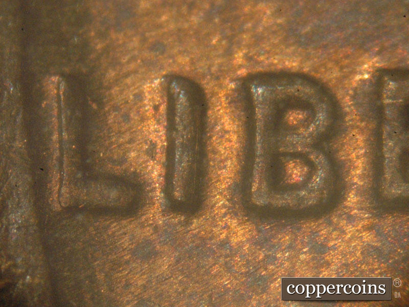 Die-stage C marker on 1917P•1DO•001 showing LIOB in LIBERTY.