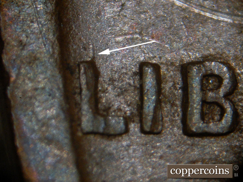 Die-stage A marker on 1917P•1DO•002 showing Gouge on top of L in LIBERTY.