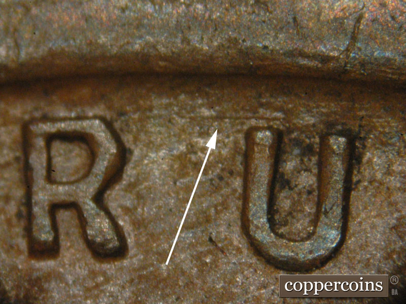 Die-stage A marker on 1917P•1DO•002 showing Die scratch above U in TRUST.