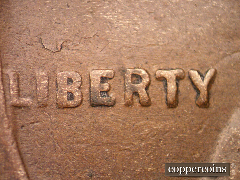 Die-stage B marker on 1919S•1DO•001 showing LIBERTY.