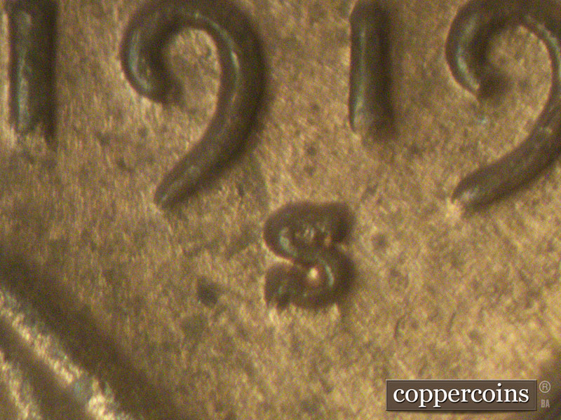 Die-stage C marker on 1919S•1MM•001 showing Closeup of repunched mintmark.