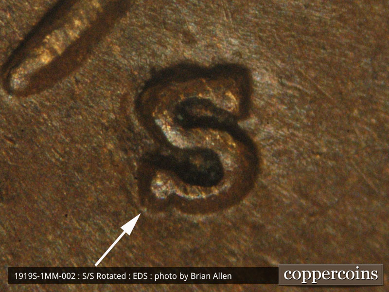 Die-stage A marker on 1919S•1MM•002 showing Minor split in the lower serif.