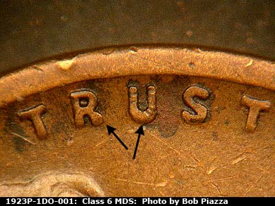 Die-stage B marker on 1923P•1DO•001 showing Extra thickness on TRUST.