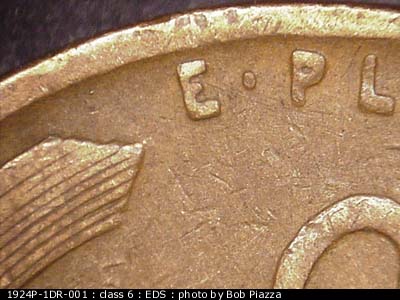 Die-stage A marker on 1924P•1DR•001 showing An obvious spread is seen on E PLURIBUS UNUM as well as both dots.