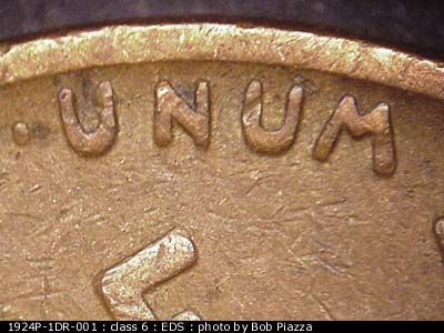 Die-stage A marker on 1924P•1DR•001 showing An obvious spread is seen on E PLURIBUS UNUM as well as both dots.