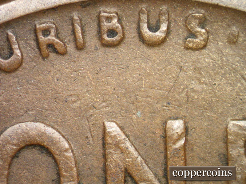 Die-stage B marker on 1924S•1DR•001 showing Extra thickness shows on EPU and both wheat steams and stalks.