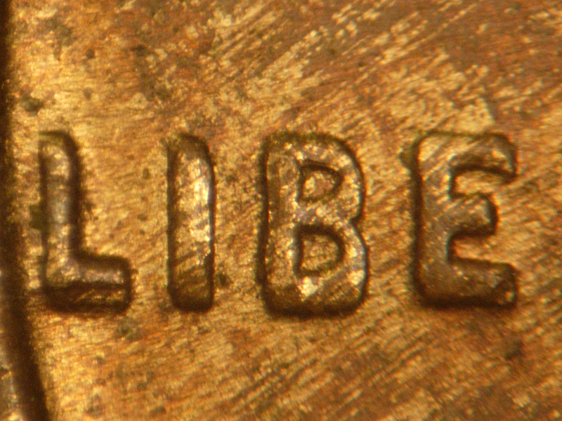 Die-stage B marker on 1927P•1DO•001 (1927 Doubled Die Obverse).
