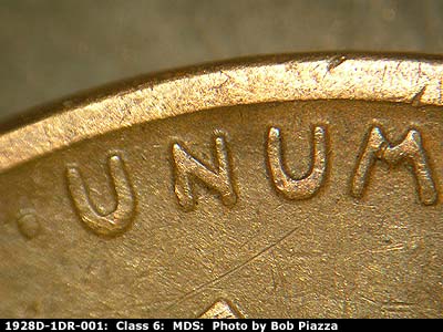 Die-stage B marker on 1928D•1DR•001 (1928 Doubled Die Reverse).