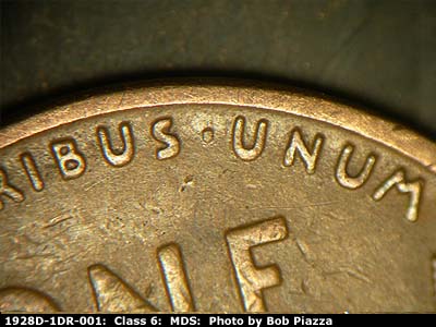 Die-stage B marker on 1928D•1DR•001 (1928 Doubled Die Reverse).