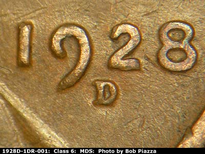 Die-stage B marker on 1928D•1DR•001 (1928 Doubled Die Reverse).