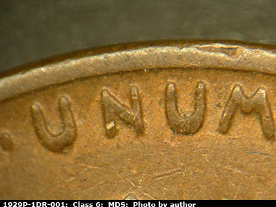 Die-stage B marker on 1929P•1DR•001 (1929 Doubled Die Reverse).