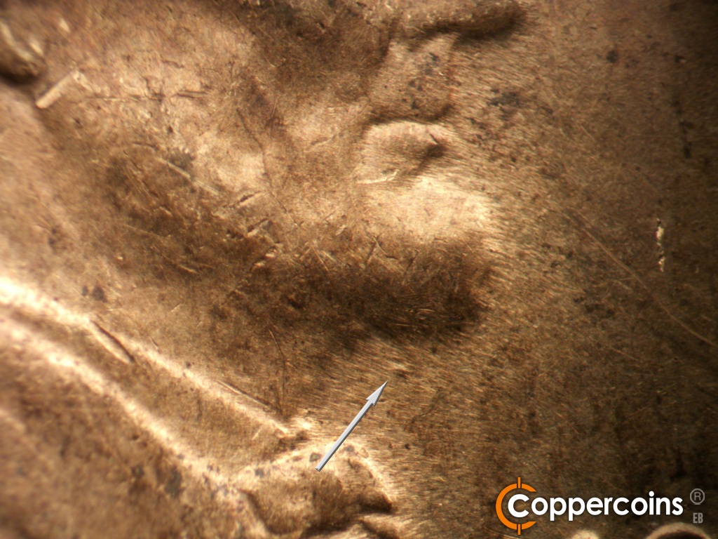 Die-stage B marker on 1929S•1MM•001 showing Die dot under chin.