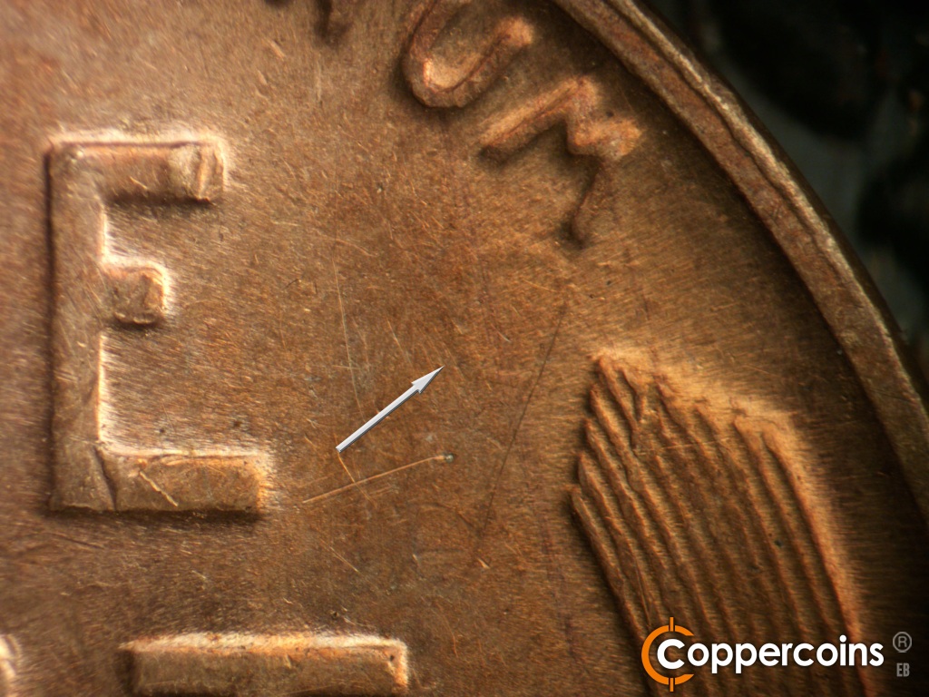 Die-stage B marker on 1929S•1MM•001 showing DIe clash above right wheat tip.